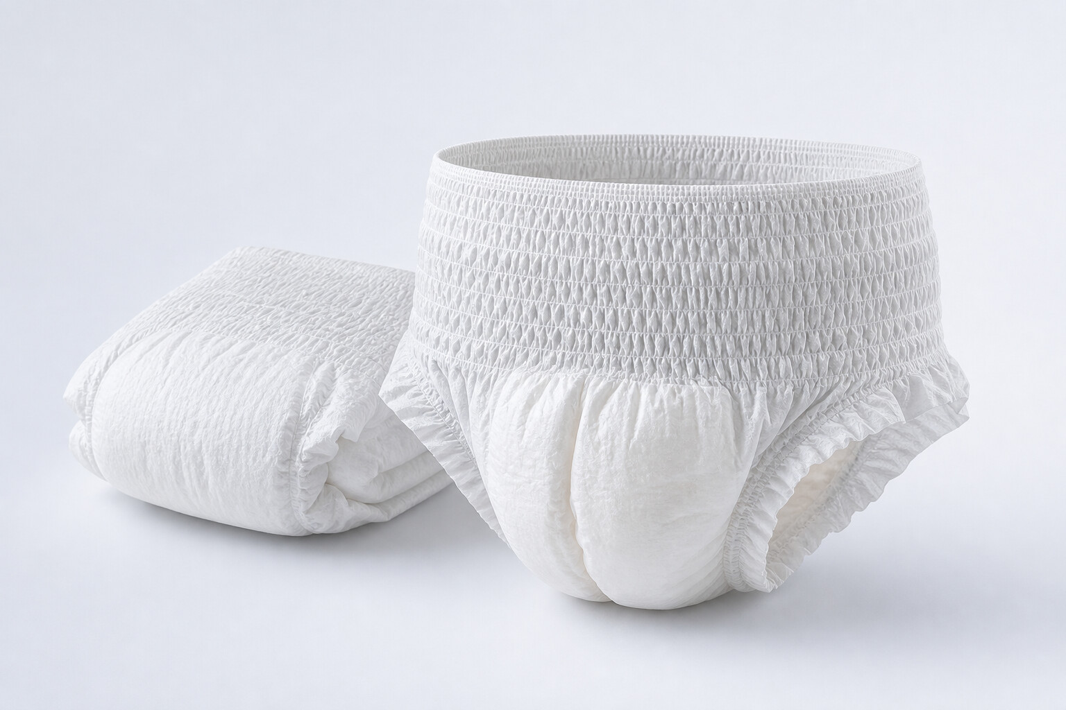 Unbranded adult pull-up diapers in a clean studio product display