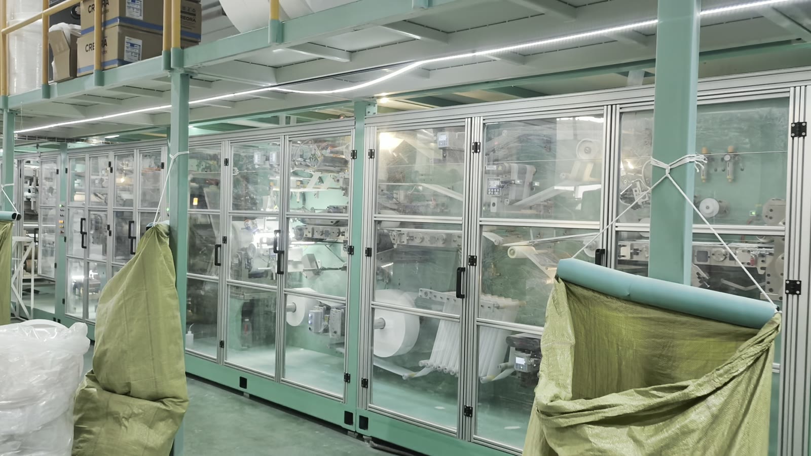Long run of full-servo converting modules behind glass guards